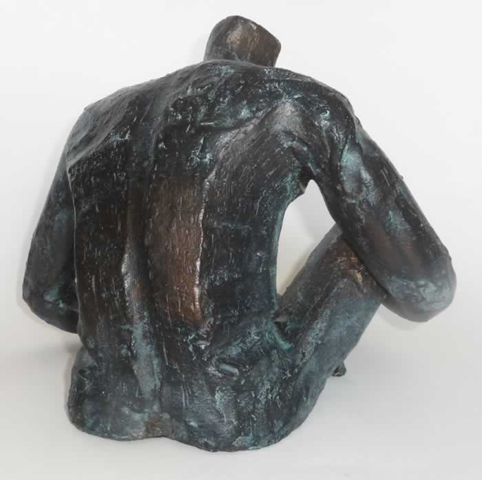 Seated Man Fired ceramic, painted bronze, patina, wax - H 23 x W 32 x D 28 cm
