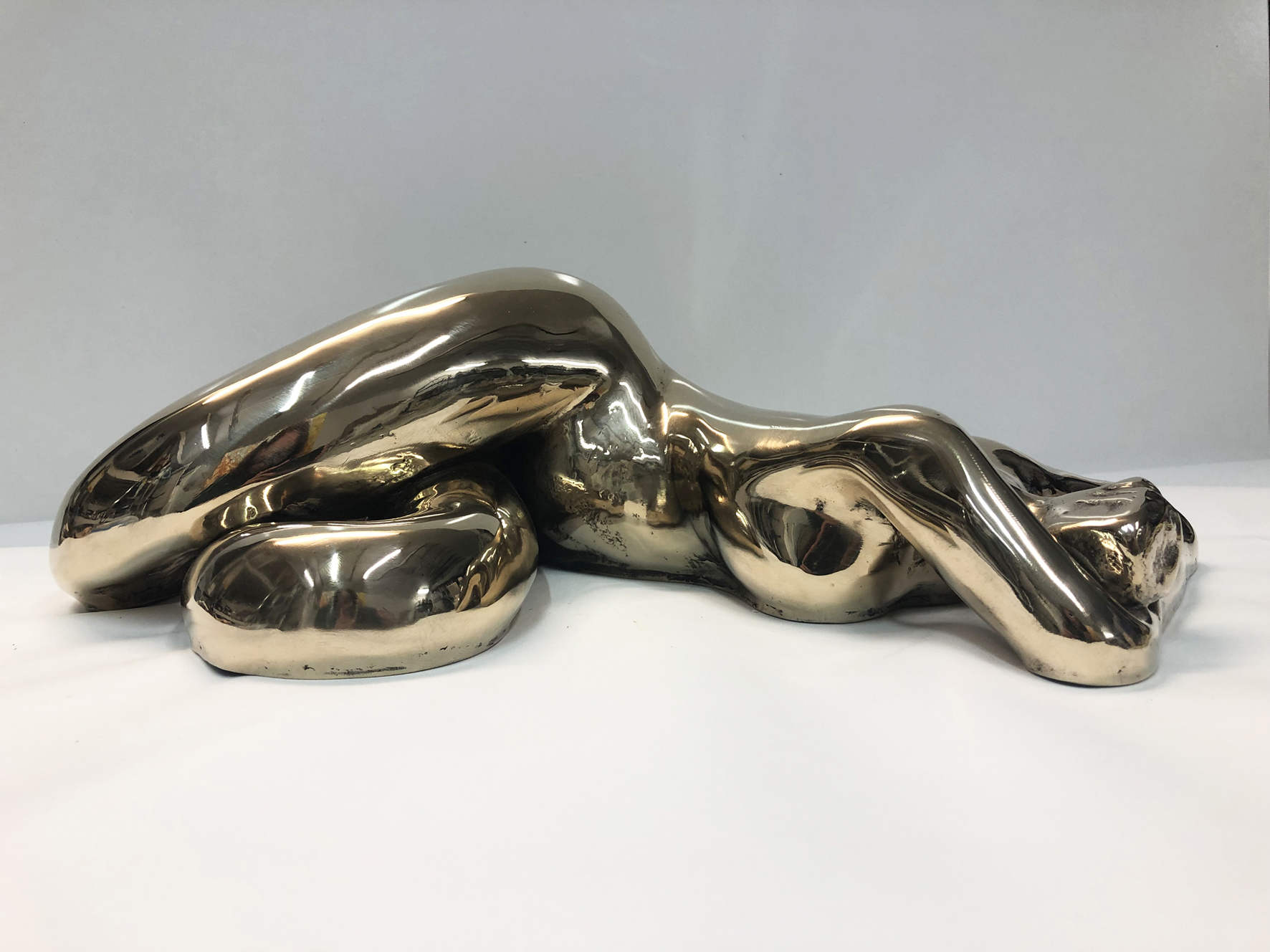 Sculptures - Recumbent nude shiny
