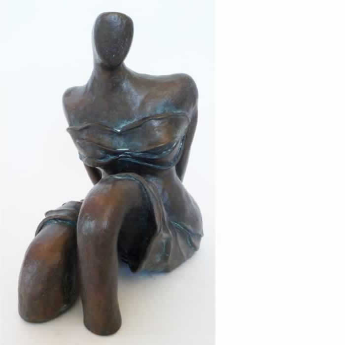 Woman Sitting Fired ceramic, painted bronze, patina, wax - 25 H x 16 W x 24 D cm